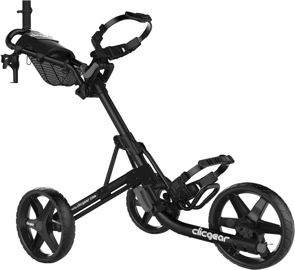 Lightweight three-wheel golf push cart rolling up a sunny fairway