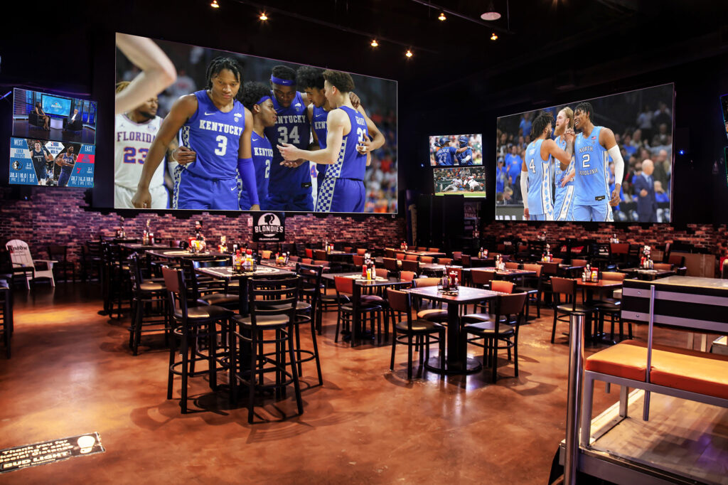 Interior of Blondies Sports Bar with giant TV screens