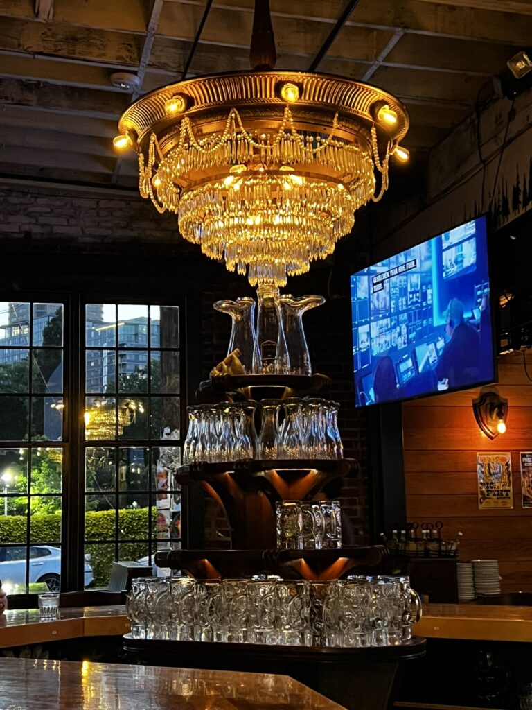 Glass tower at Rein Haus Seattle that has a boot glass at the top