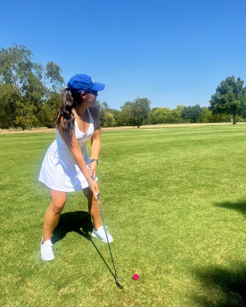 Golfer taking an iron approach from the fairway on the MacKenzie Course at Haggin Oaks, Sacramento