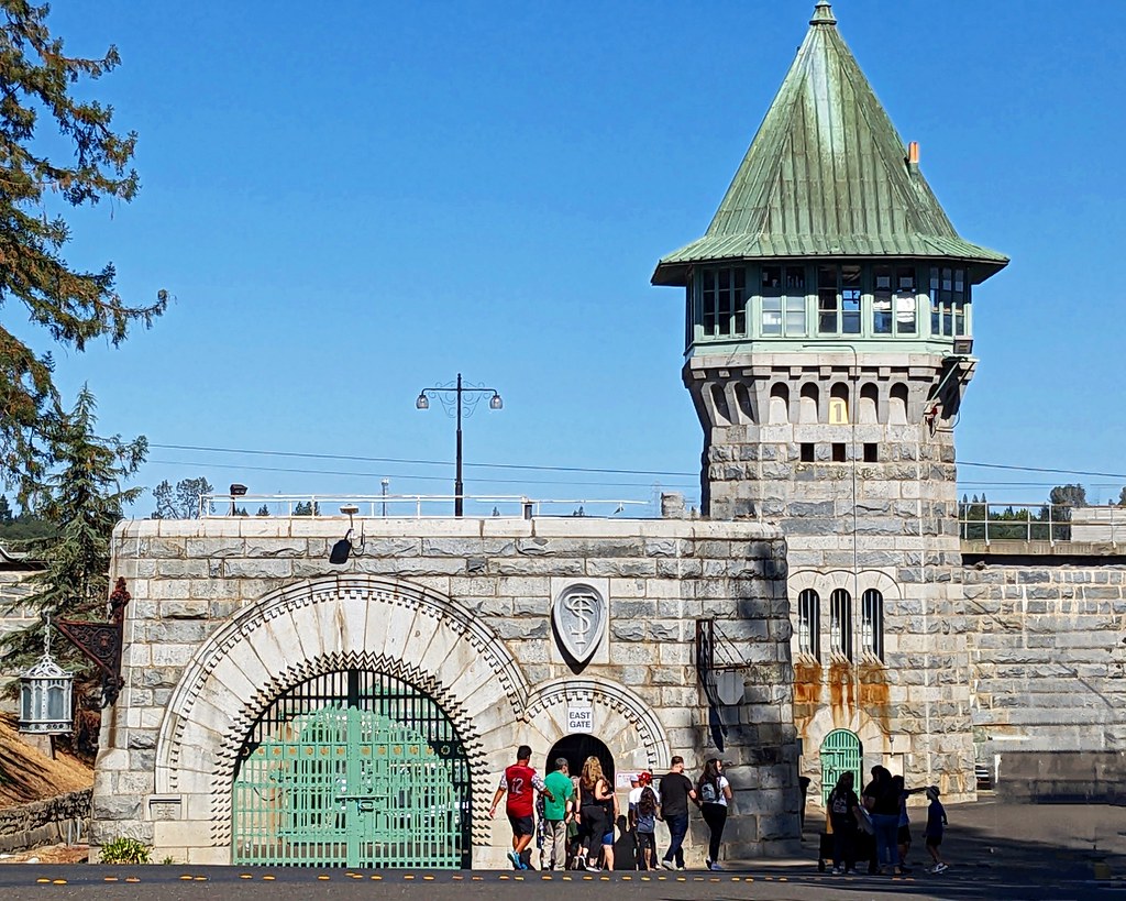 Granite East Gate and guard tower at Folsom State Prison, viewed from the public entrance.