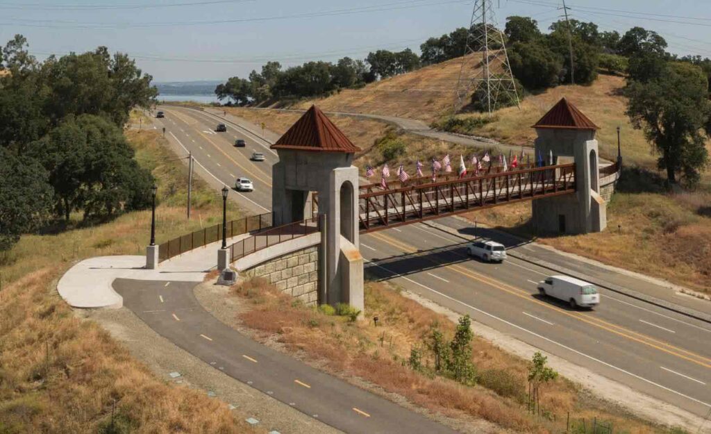Johnny Cash Trail overcrossing bridge with distant view toward Folsom State Prison.